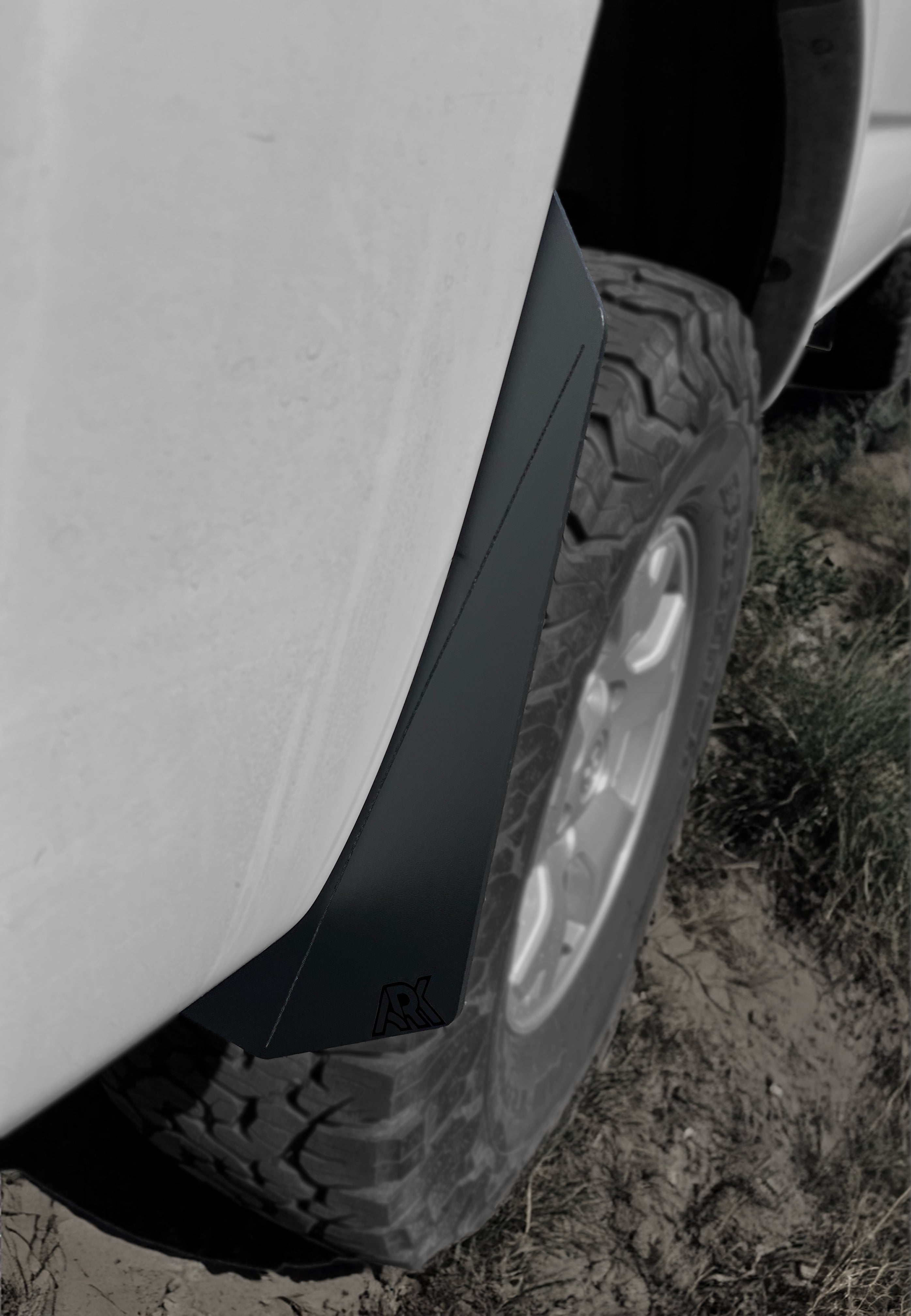 TriXpoly splash guards for 2005-2015 Toyota Tacoma, designed for durability and protection against mud and debris.