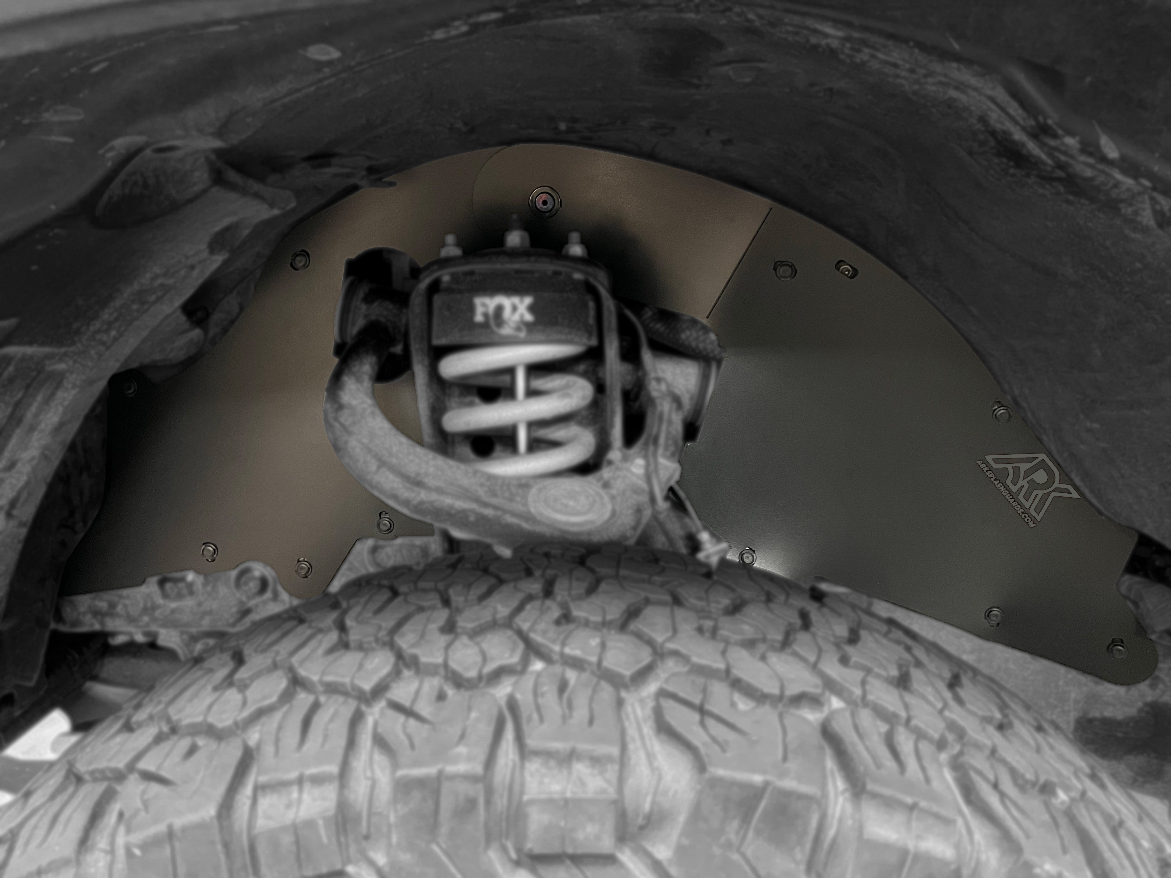 TriXpoly splash guards for 2016-2023 Toyota Tacoma, designed for durability and protection against mud and debris.