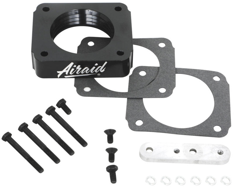 Airaid PowerAid throttle body spacer for 98-04 Ford Mustang GT 4.6L SOHC, includes gaskets and installation hardware.