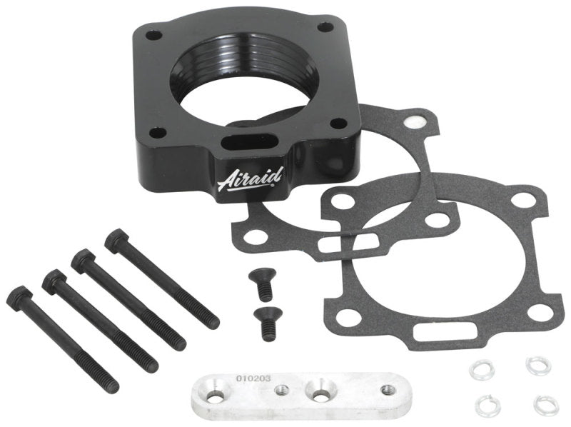 Airaid PowerAid throttle body spacer for 99-01 Ford Mustang 3.8L, includes gaskets and installation hardware.