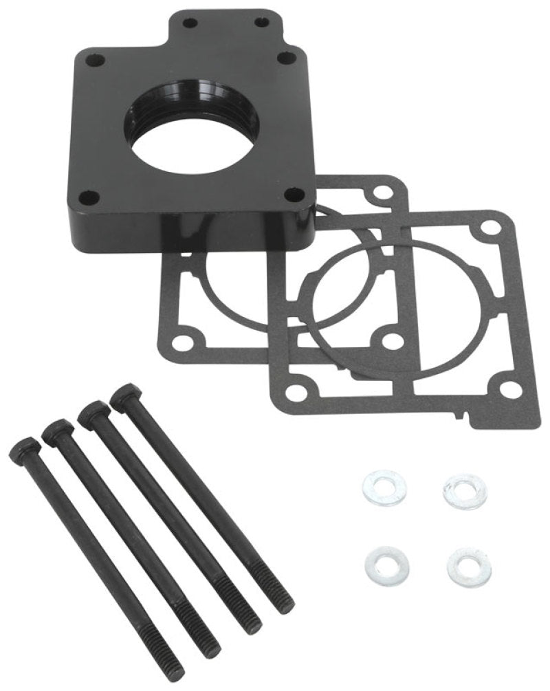 Airaid PowerAid throttle body spacer for 88-93 Ford Mustang 5.0L with gaskets and installation hardware included.