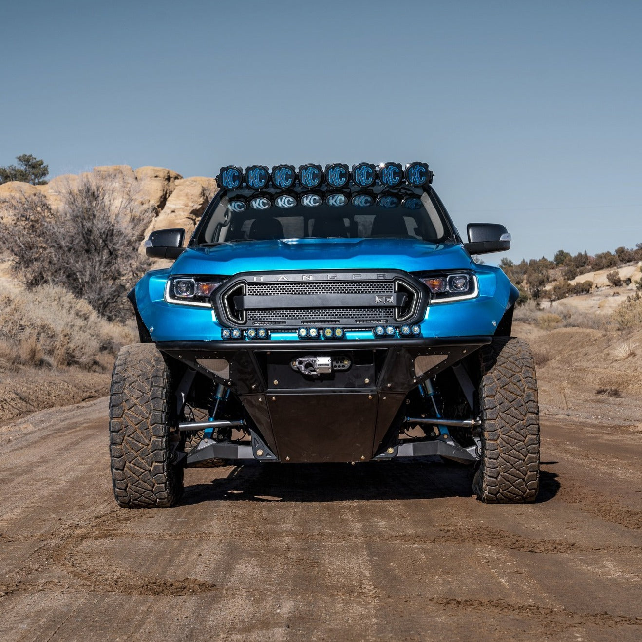 2019-2022 Ford Ranger fenders on a modified blue truck with offroad lights, showcasing rugged design for offroad performance.