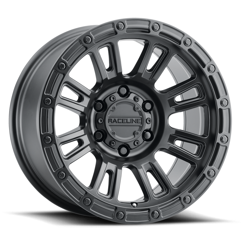 Raceline 956B Compass wheel featuring a sleek design with a dark finish and multiple spokes, ideal for offroad vehicles.