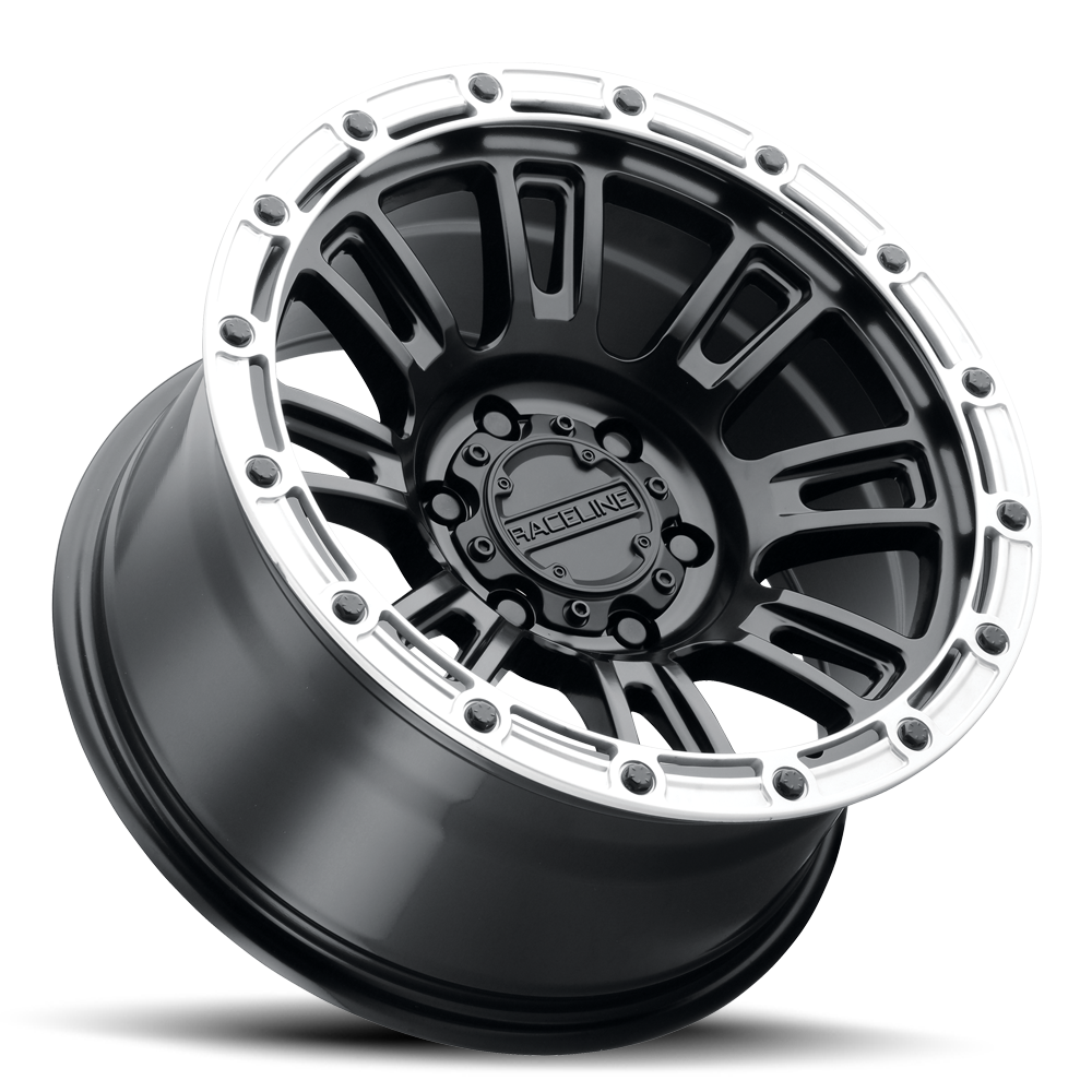 Black and silver Raceline 956BS Compass wheel with a rugged design, ideal for offroad vehicles and custom builds.