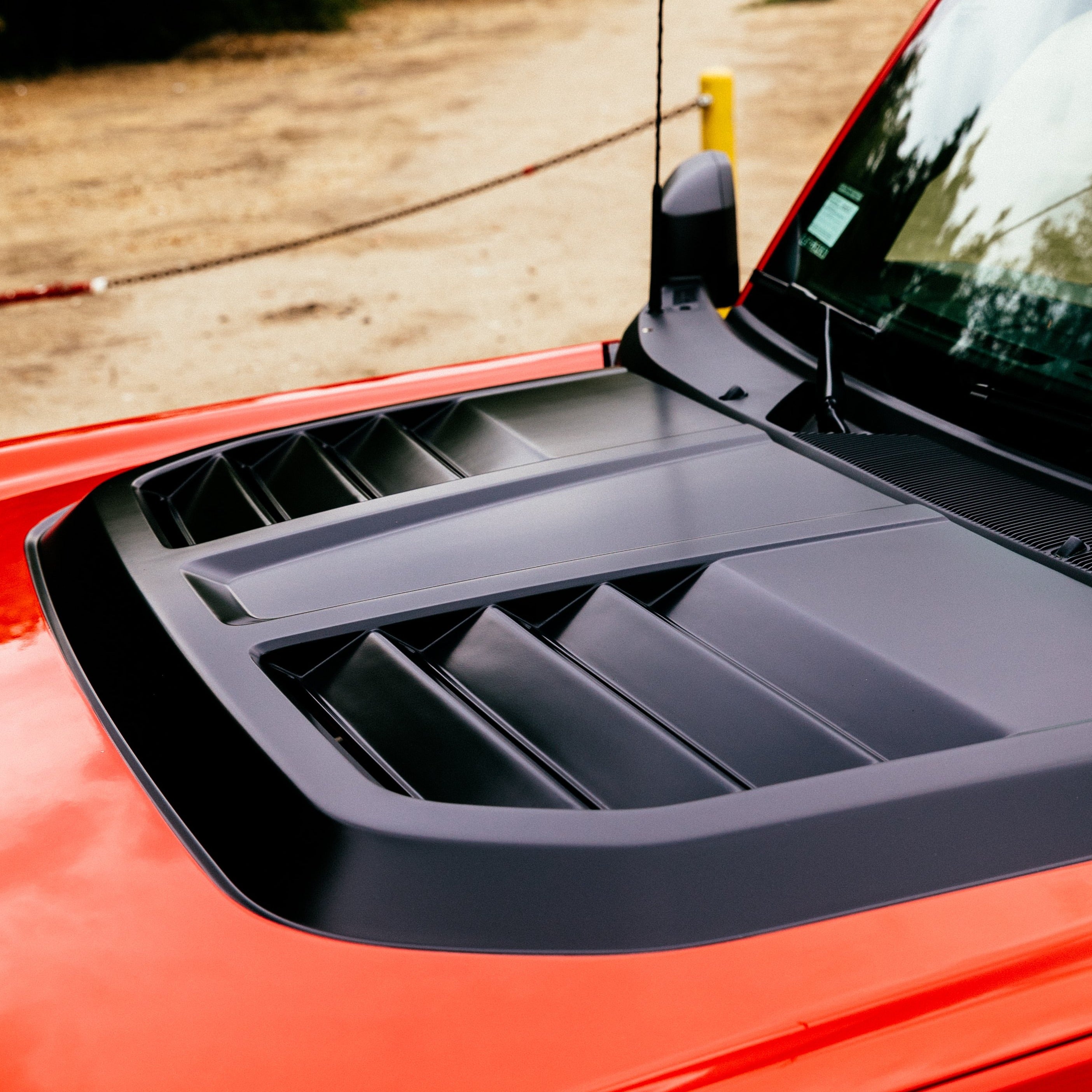 2021-2024 Ford Bronco heat extractor hood showcasing sleek design and functional vents for improved engine cooling.