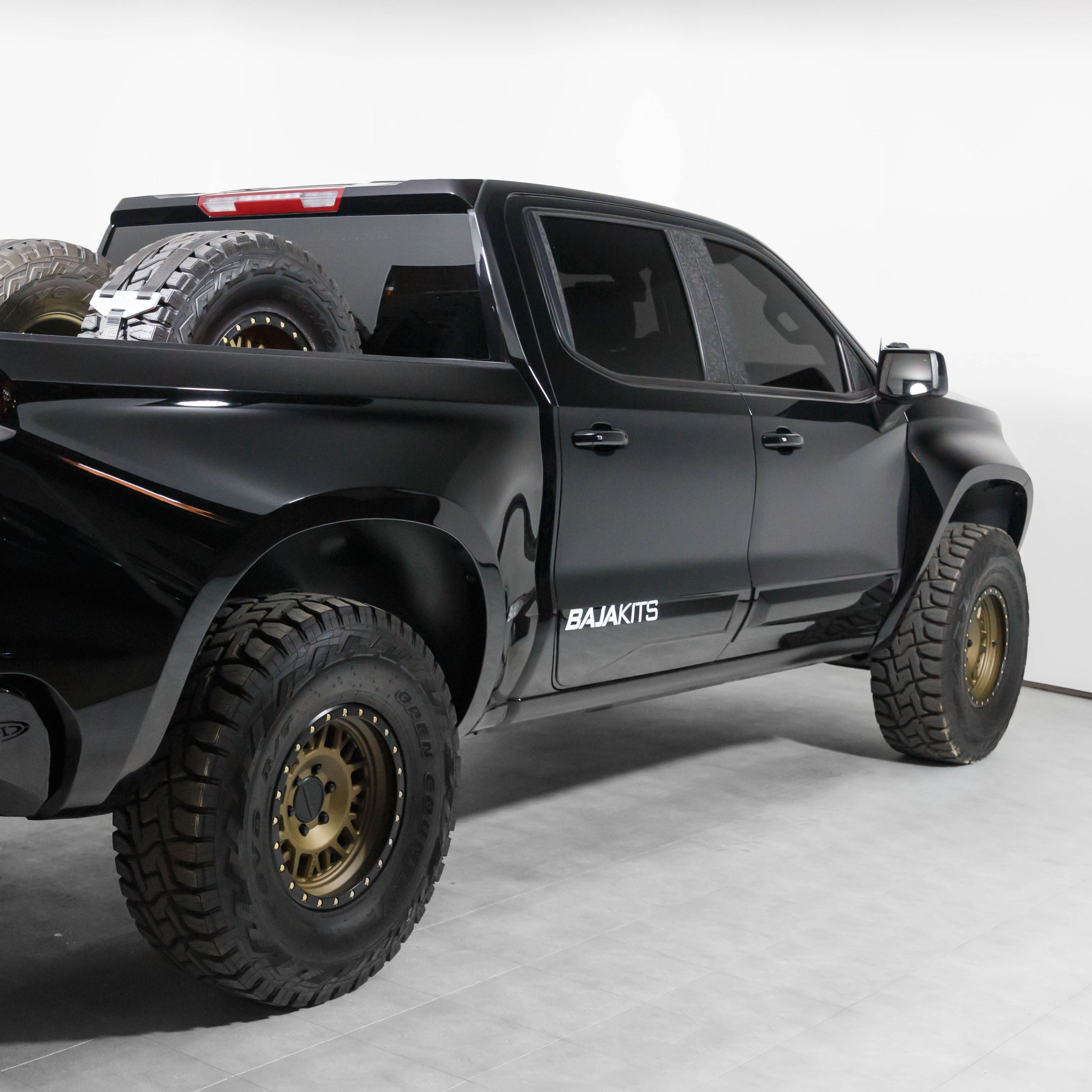2019-2021 Chevrolet Silverado with aftermarket fenders showcasing a rugged offroad design and aggressive stance.