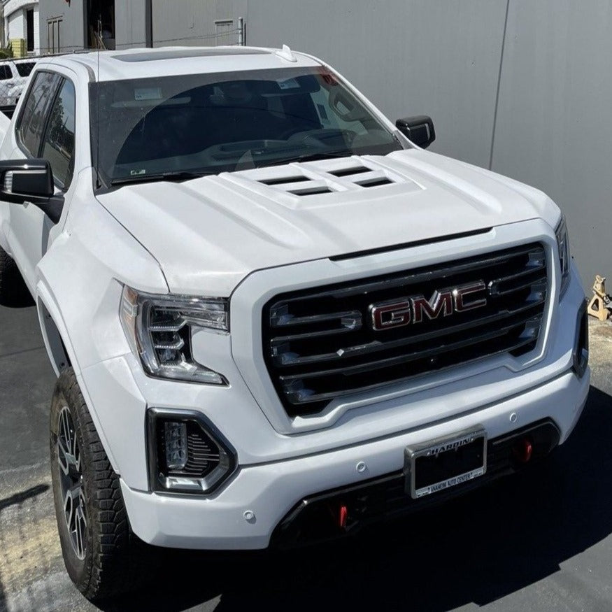 2019-2021 GMC Sierra hood showcasing a sleek design, perfect for enhancing performance and style. Ideal for truck enthusiasts.