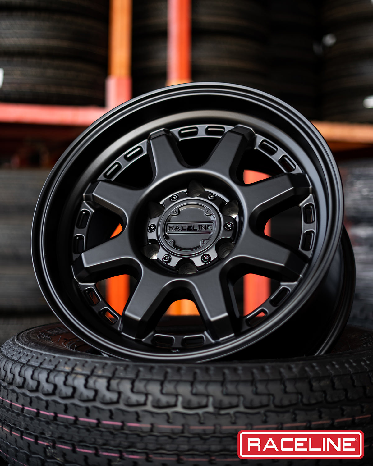 Black Raceline 947B Scout wheel displayed on a tire, showcasing its rugged design and off-road capabilities.