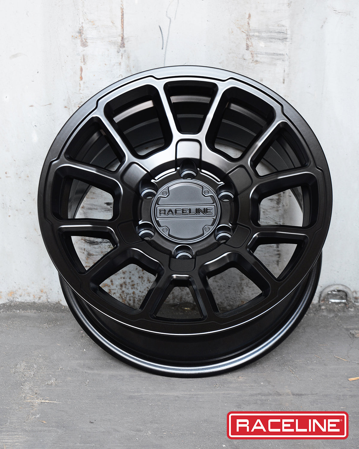Black Raceline 950B Gauge wheel with a multi-spoke design, showcasing a sleek and modern offroad style.