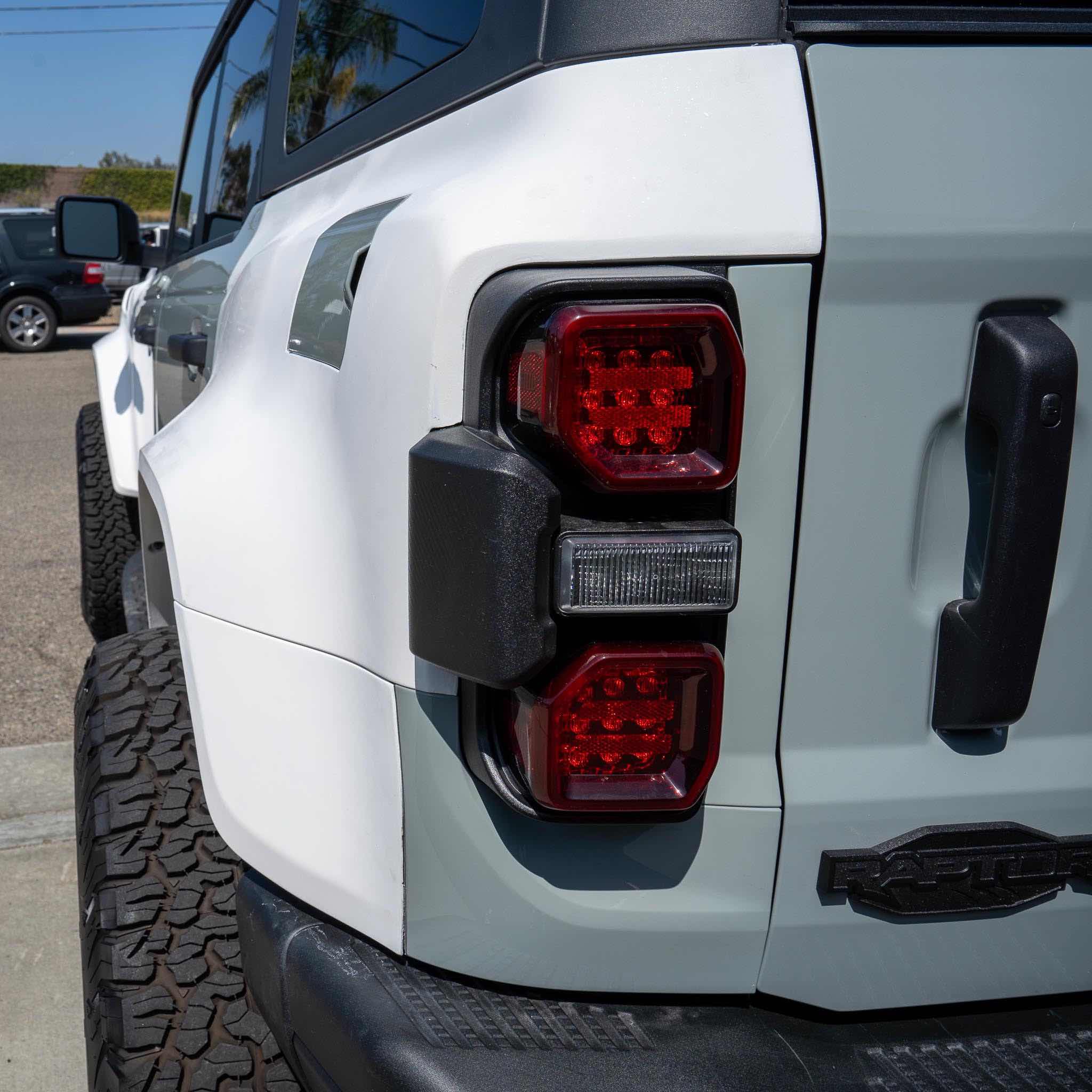 2022-2024 Ford Bronco Raptor rear quarter kit showcasing sleek design and integrated taillights for enhanced offroad performance.