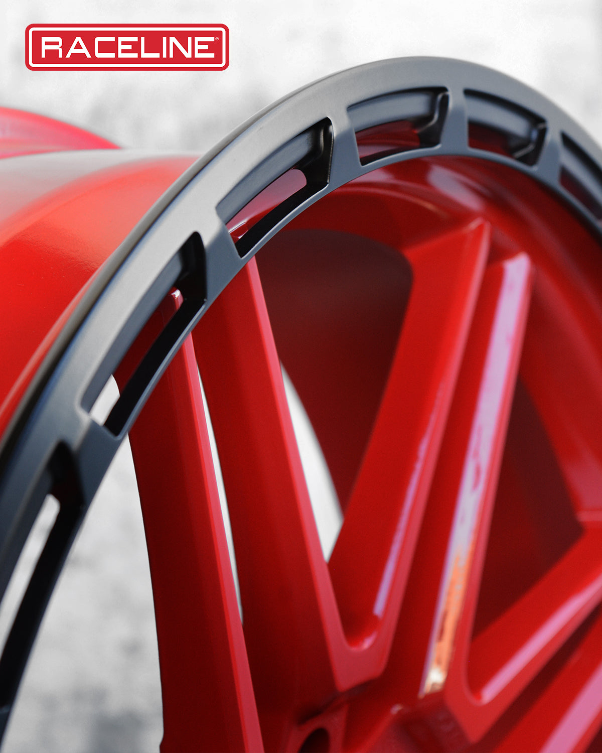 Close-up of the A11R Krank XL wheel showcasing its vibrant red finish and unique design features for offroad vehicles.