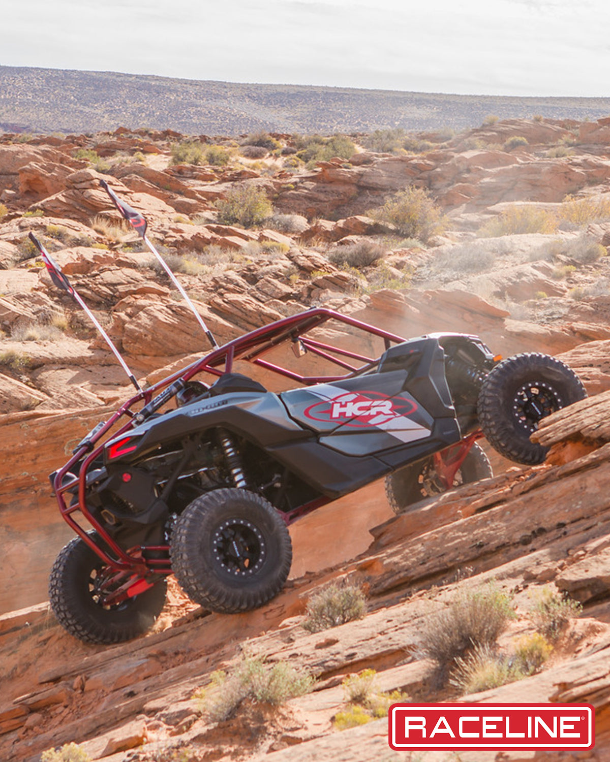 A71B Black Mamba Beadlock wheel mounted on a UTV climbing a rocky terrain in a desert landscape.