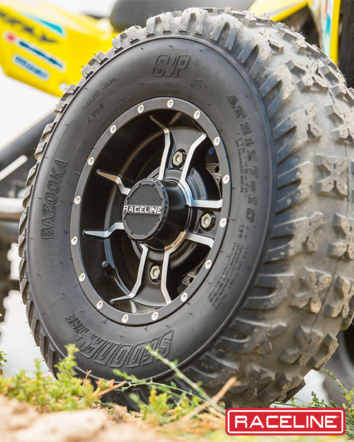 A close-up of the A77 Mamba wheel featuring a sleek design and rugged tire, ideal for offroad vehicles.