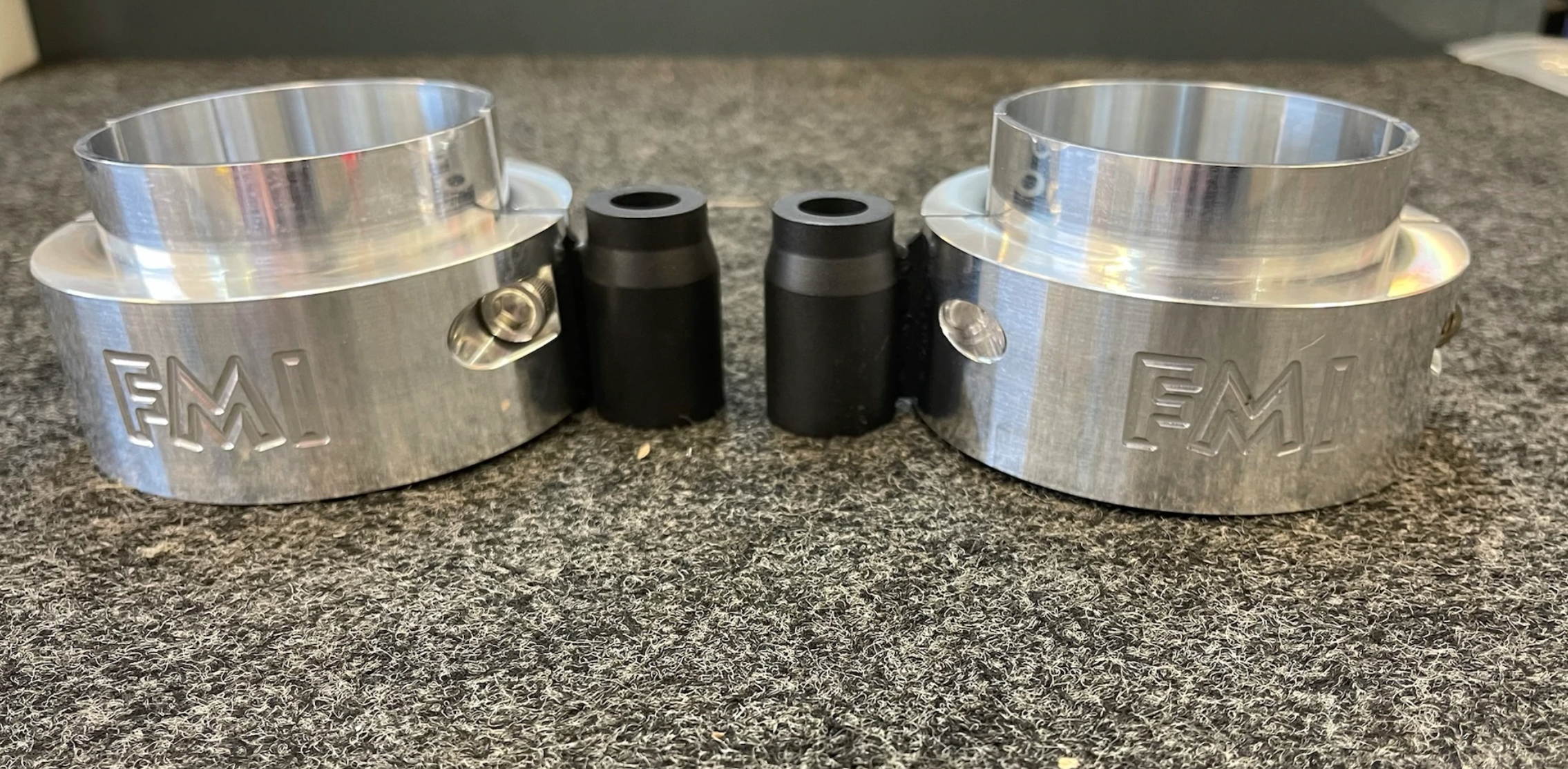 Front leveling kit for 2021-2022 RAM TRX by Foutz Motorsports, featuring aluminum spacers and black inserts for lift.