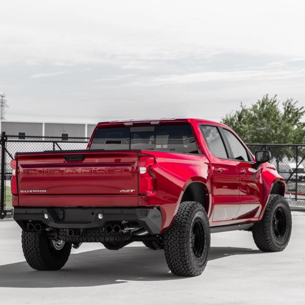 2019-2021 Chevrolet Silverado with custom bedsides, showcasing a bold red exterior and off-road tires.