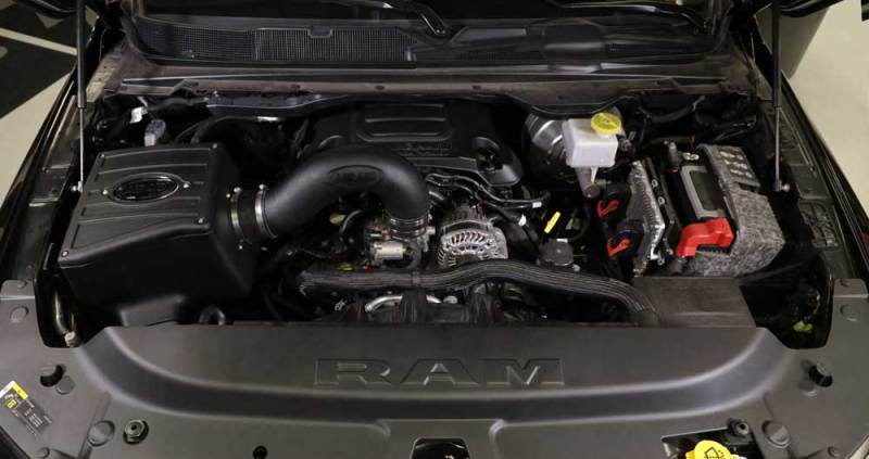 Airaid 2019 Dodge Ram 5.7L V8 intake system installed in an engine bay, showcasing performance upgrades and components.