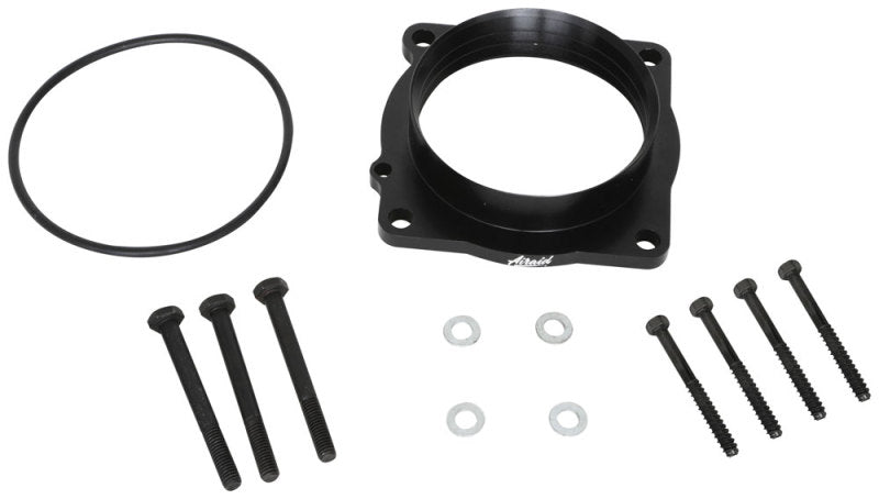 Airaid PowerAid throttle body spacer kit for 2005-2013 Dodge Charger R/T, 2005-2008 Magnum, 2008-2013 Challenger, and 2006-2010 Jeep GC.