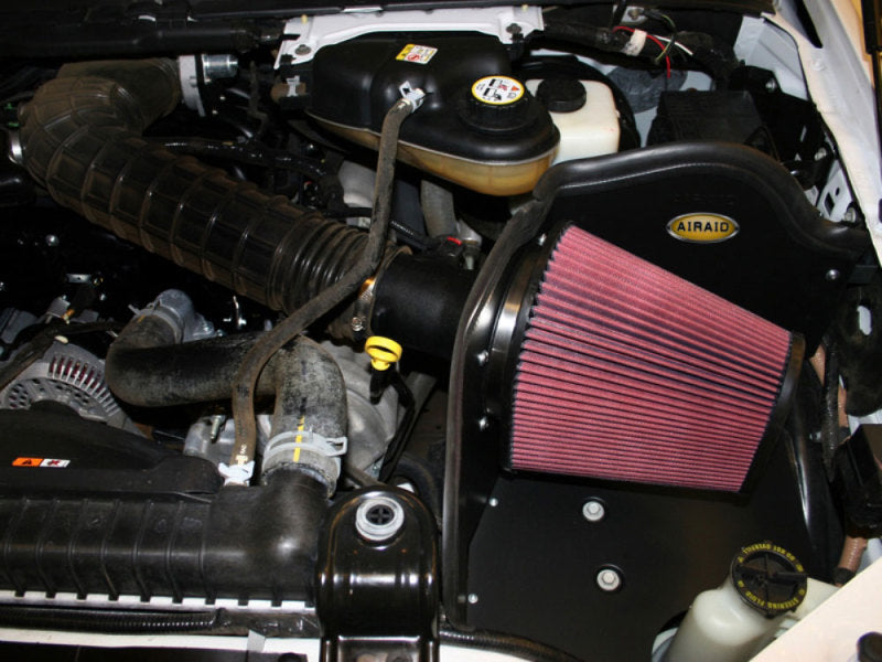 Airaid CAD intake system for 05-07 Ford F-250/350 6.8L V-10, featuring oiled red filter and engine compartment view.