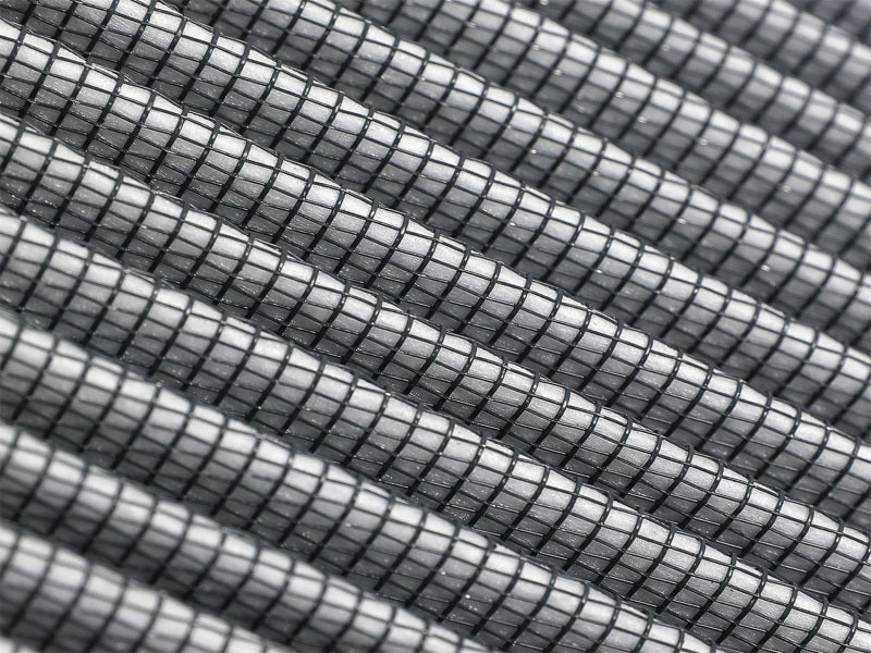 Close-up of aFe Magnum FLOW intake air filter showcasing PDS media with a textured surface for optimal airflow and filtration.