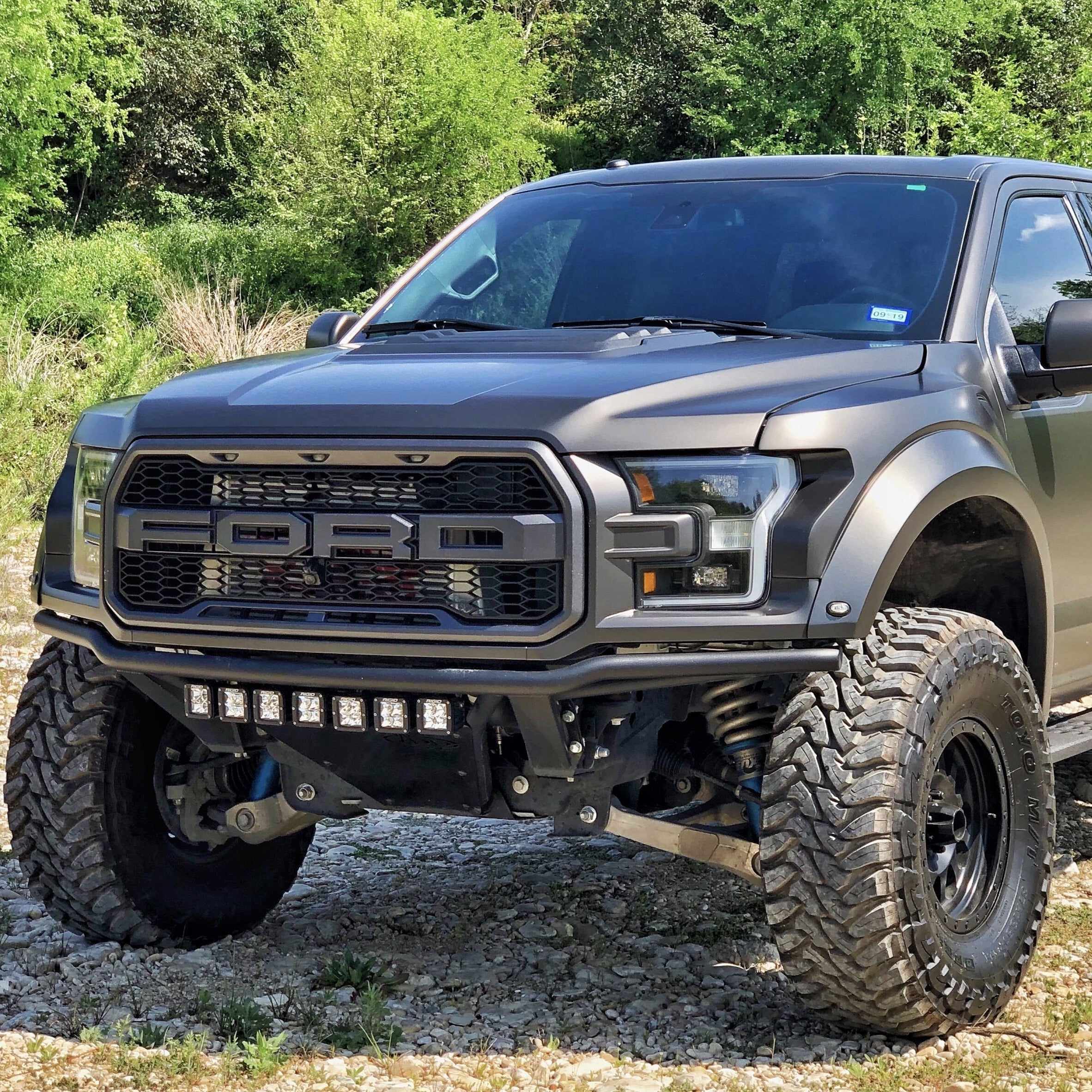 2017-2020 Ford Raptor fenders showcasing rugged design and enhanced off-road capability on a modified truck.