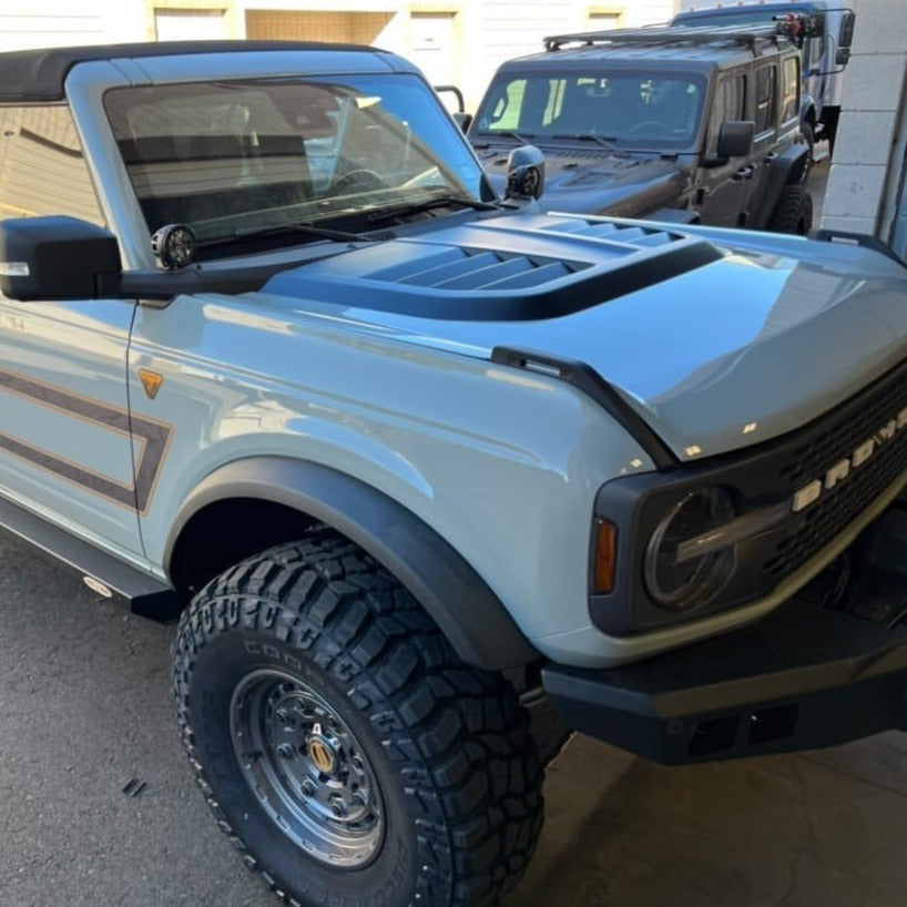 2021-2024 Ford Bronco with a heat extractor hood, showcasing rugged design and off-road capability.