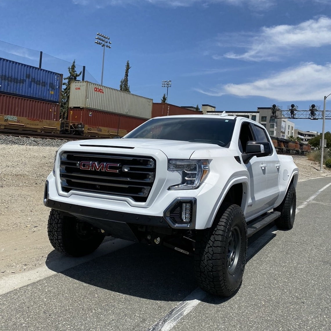 2019-2021 GMC Sierra with aftermarket bedsides, showcasing a rugged offroad design and elevated stance.