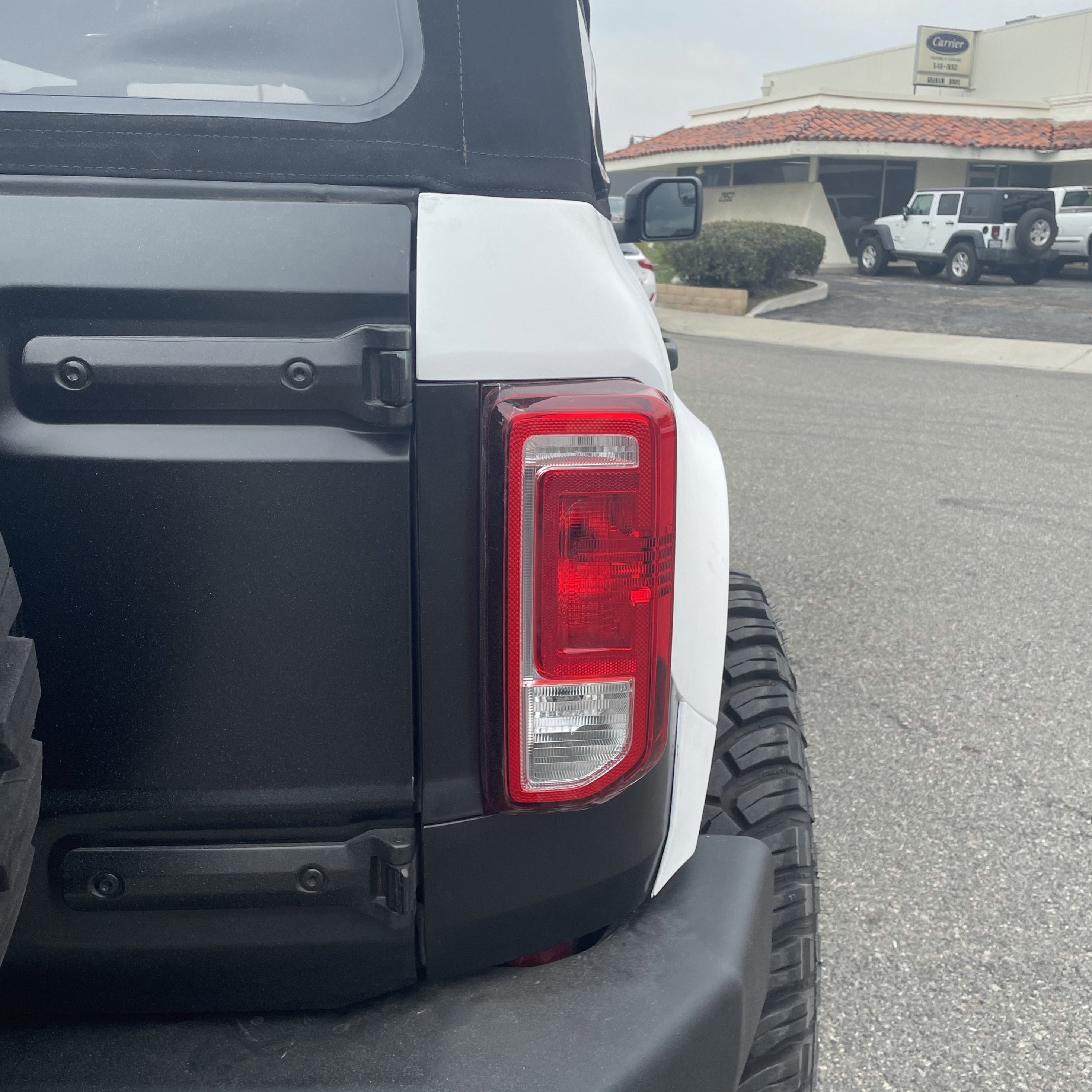2021-2022 Ford Bronco 4-Door Rear Quarter Kit showcasing a close-up view of the rear quarter panel and taillight.
